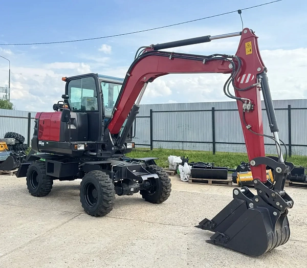 Купить колёсный экскаватор QUADTRAC E60W | Объём ковша 0,175 м³, скорость поворота башни 10 об/мин - КИИТ