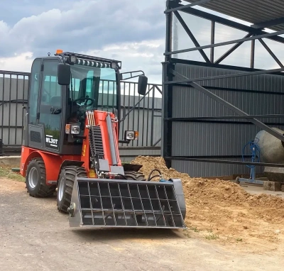  Телескопический мини-погрузчик QUADTRAC WL30T (1000 кг, высота подъема 3260 мм, двигатель Perkins). Изображение №2