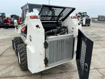 Бортовой мини погрузчик XTRAC S12 (1250 кг). Изображение №13