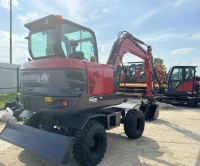 Фото колёсный экскаватор quadtrac e60w (5,5 т, двигатель yanmar 4tnv98, 46,3 квт, производительность 163 л/мин) на сайте www.kiit.ru в интернет-каталоге КИИТ ☎ +7(800) 707-07-45 Изображение №9