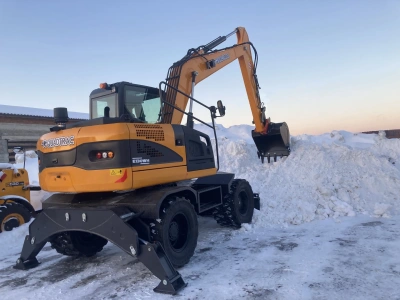 Колёсный экскаватор QUADTRAC E130WH (125 л.с., 0,6 м³, гидравлика REXROTH, КПП HST-автомат). Изображение №4