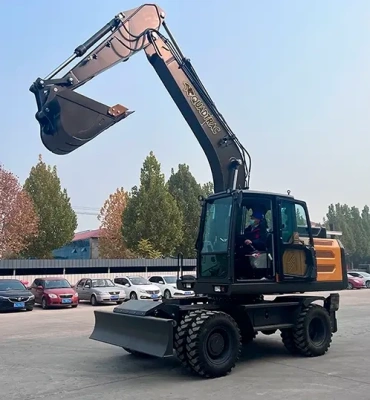 Колёсный экскаватор QUADTRAC E180W (16,5 т, двигатель CUMMINS 6BTAA5.9-C178, 170 л.с., 0,8 м³). Изображение №2
