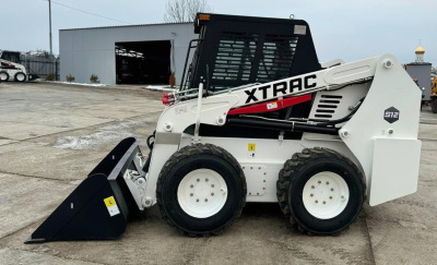 Бортовой мини погрузчик XTRAC S12 (1250 кг). Изображение №5