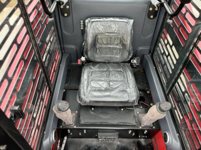 Мини погрузчик с бортовым поворотом QUADTRAC SSL85. Изображение №22