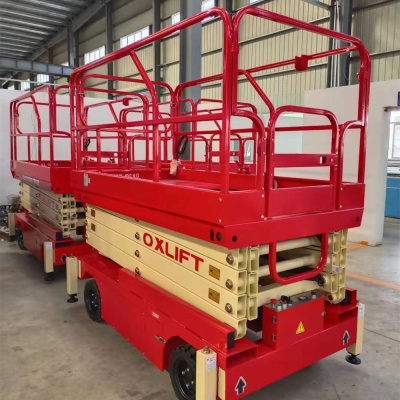 Ножничный подъемник QX-050-120 OXLIFT 500 кг 12 м. Изображение №2