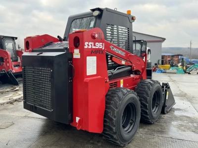 Колесный мини погрузчик с бортовым поворотом QUADTRAC SSL95JMAX. Изображение №14