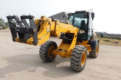 Фронтальный погрузчик QUADTRAC WL100T. Изображение №1