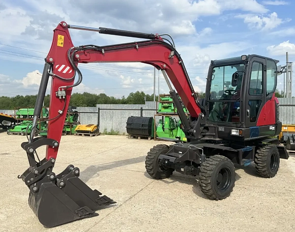Колёсный экскаватор QUADTRAC E60W | 5,5 т, двигатель YANMAR 4TNV98 (46,3 кВт), производительность насоса 163 л/мин